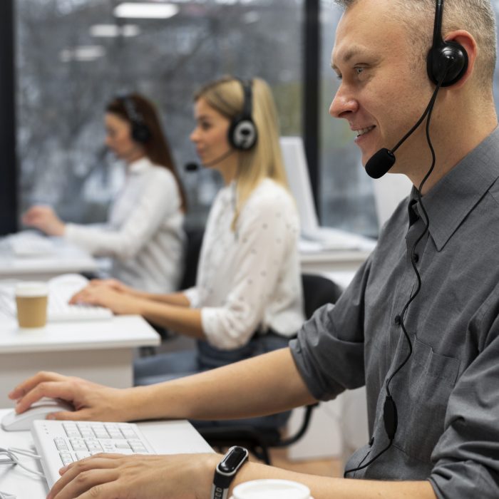 colleagues-working-together-call-center-office-with-coffee